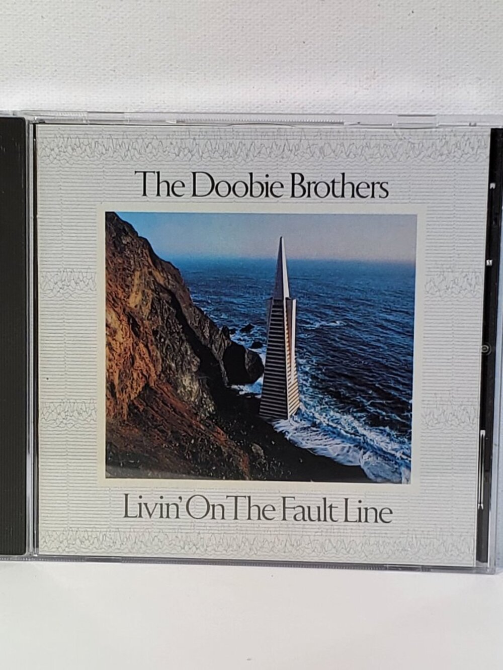 VINTAGE DOOBIE BROTHERS...LIVIN' ON THE FAULT LINE CD...1977 WARNER BROS RECORDS